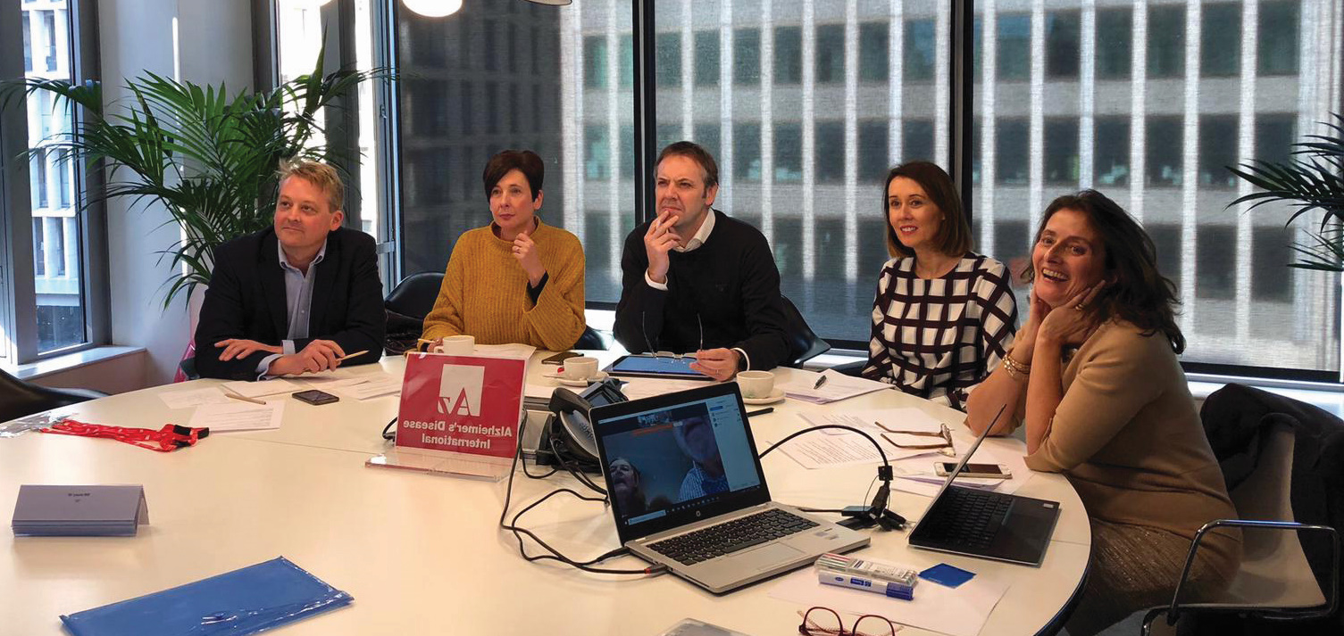 Webinar panelists around a table